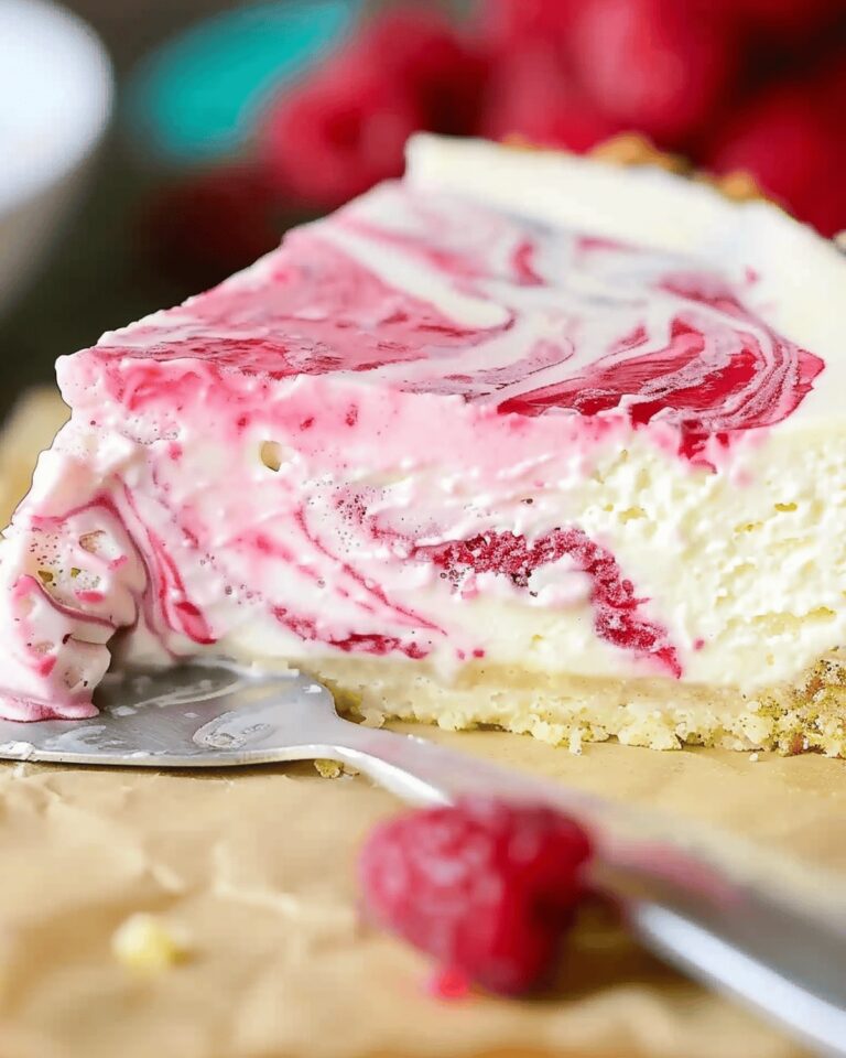 Velvety White Chocolate Raspberry Swirl Cheesecake Recipe
